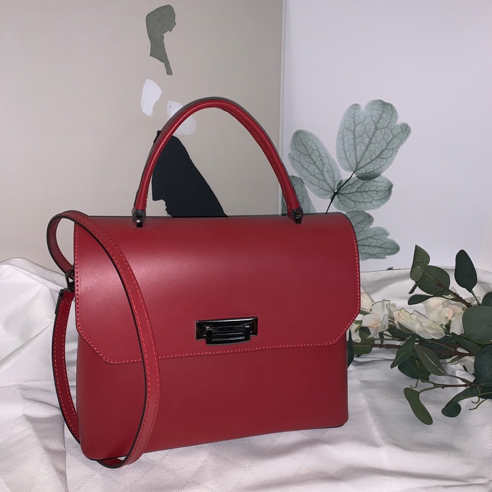 Cielo celeste designer leather handbag